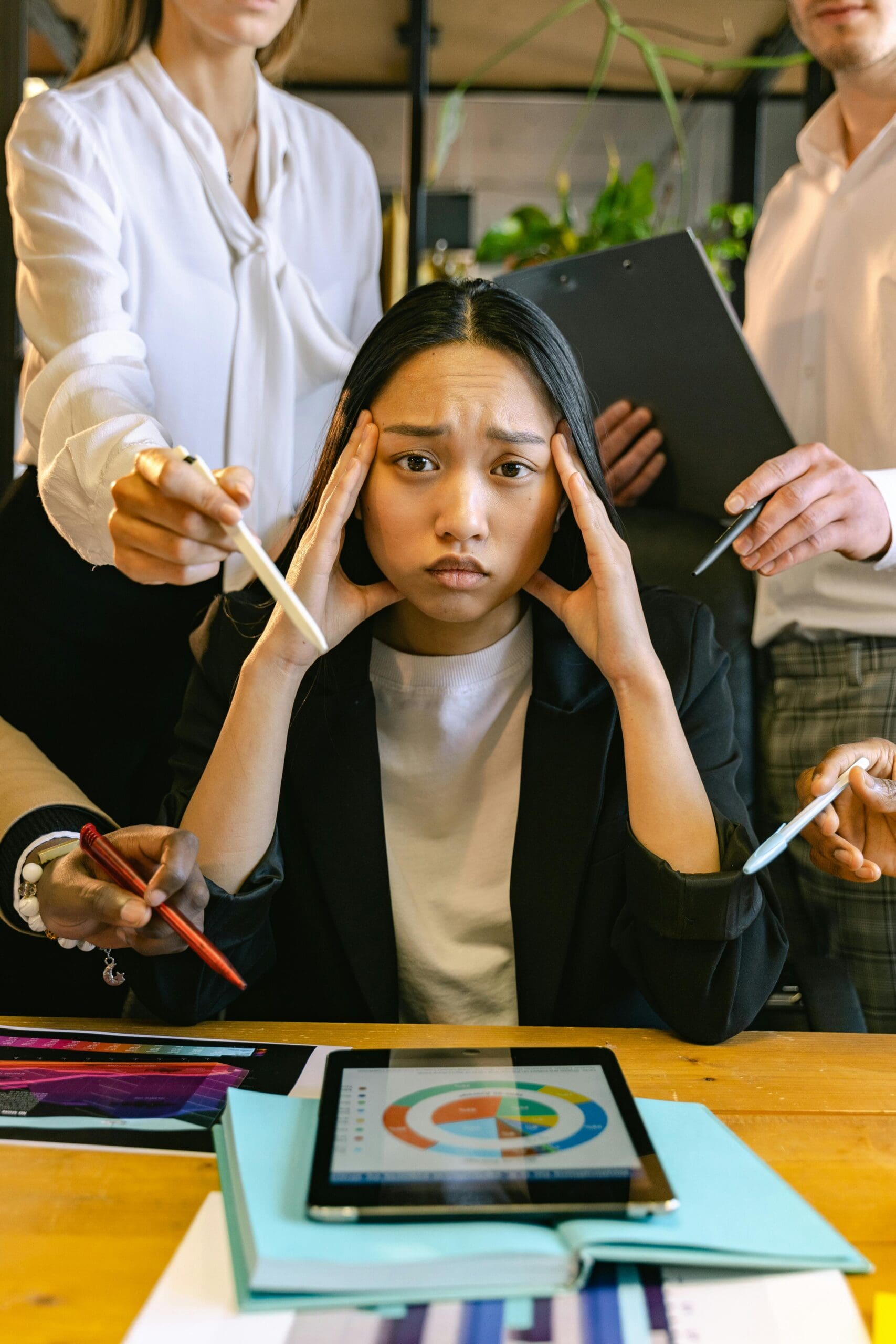 stressed woman with demanding boss